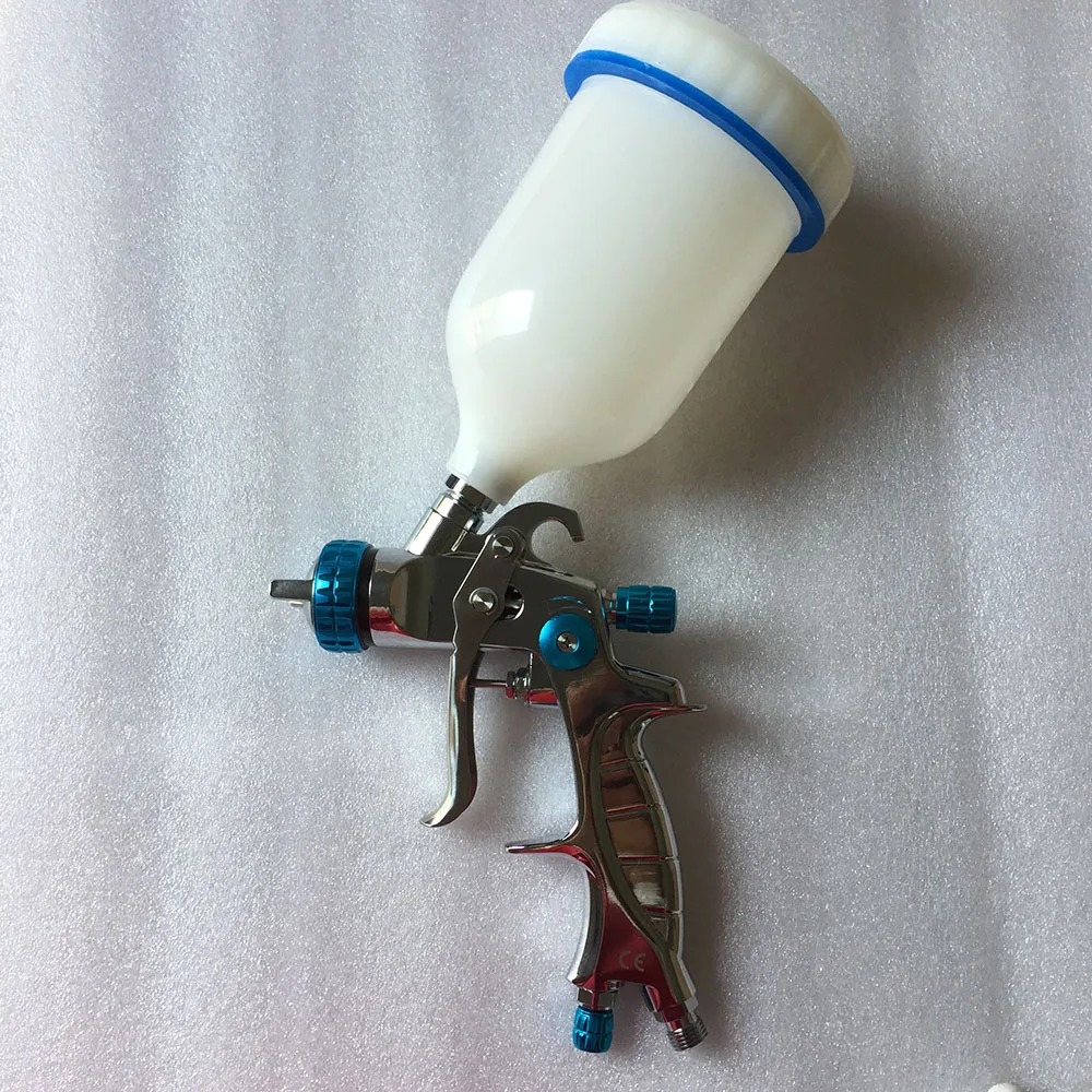 

SAT1215 HVLP Spray Gun 1.3m 1.4mm 1.7mm Stainless Steel Nozzle Paint Spray Gun Professional Airbrush Spray Gun for Painting Cars