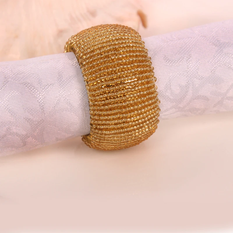 

Elegant Gold Plating With Hand Woven Champagne Color Beads Wired Circle Napkin Rings Set of 6 Pieces Home Tabletop Decor Piece