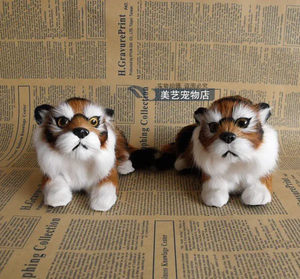 

a pair of cute simulation tiger toys lifelike lying tiger models about 17x10x9cm