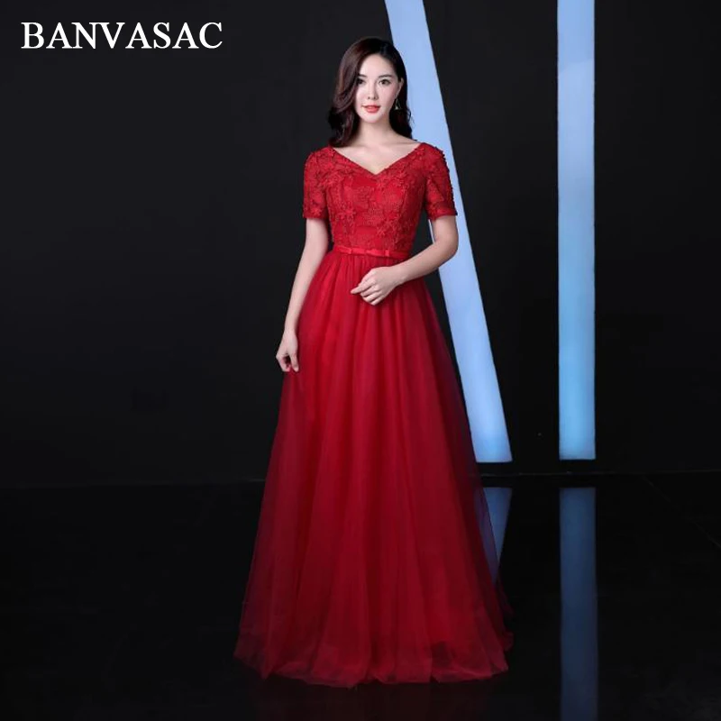 

BANVASAC 2018 V Neck Bow Sash A Line Long Evening Dresses Party Lace Appliques Short Cap Sleeve Backless Prom Gowns