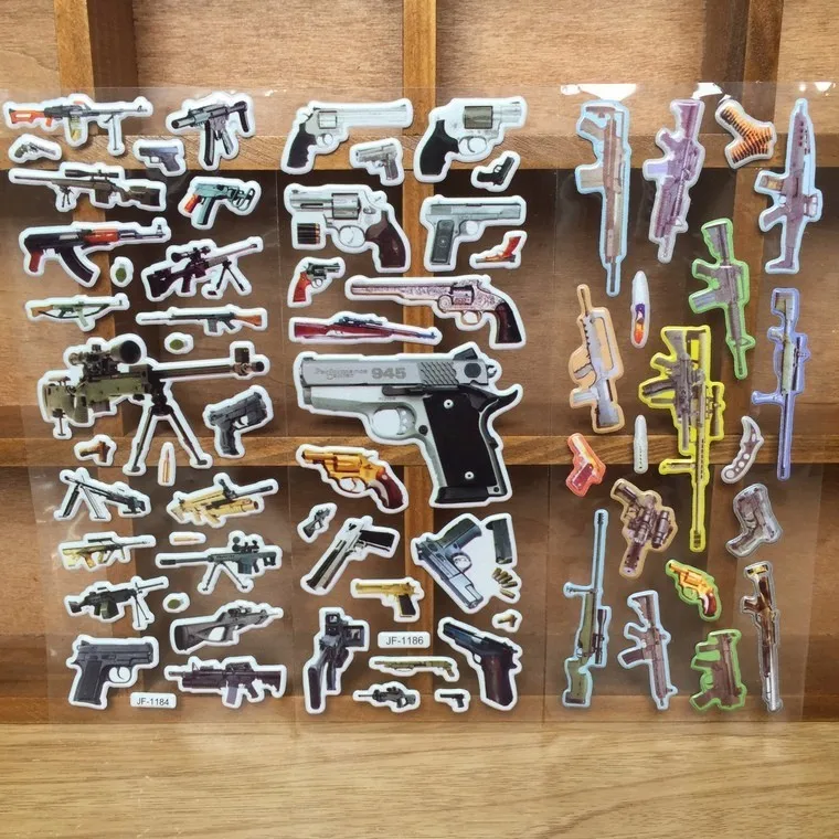 HOT!1PCS world famous gun 3D stickers home wall decor cartoon mini sticker fridge notebook for kids toys GWOLVES