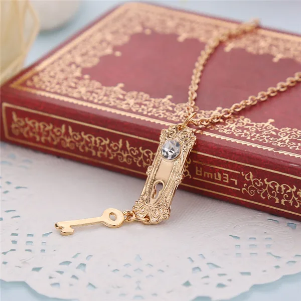 20pcs/lot Fashion Necklaces Alice in Wonderland Necklace Gold Color Key Shaped Crystal Pendant Necklace For Women Charms