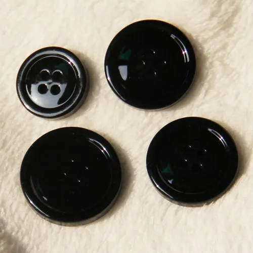 

free shipping 28mm 20pcs/lot 4-holes black buttons resin flatback buttons man suit buttons sewing accessories round buttons70