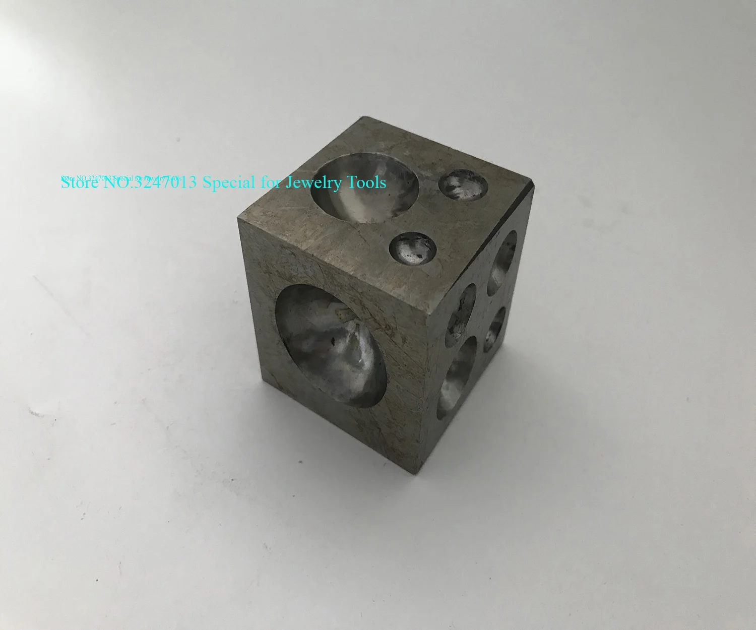 

Steel Dapping Block 38mm Punches Jewelry Manufacturing Doming Tool Square Dapping Block for Shaping Texturizing