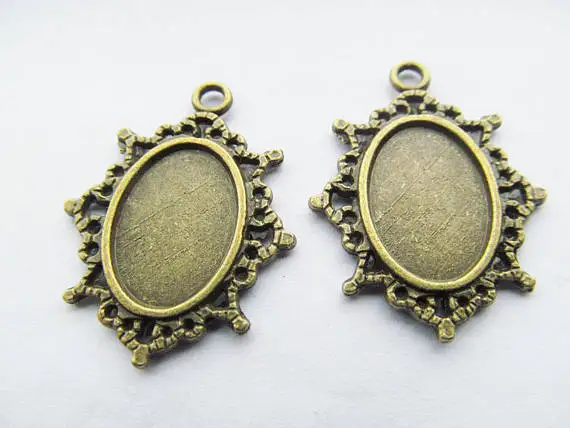 

100pcs Antique Silver/Antique Bronze Oval Flower Border Base Setting Tray Bezel Pendant Charm,fit 13mmx18mm Cabochon/Cameo