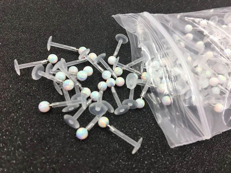 

Free shippment LOT50pcs 16G Body Piercing RETAINERS HIDE PIERCING CLEAR Lip/Labret Opalite Stones