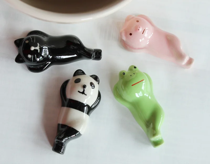 

Free shipping 50pcs Cute Cartoon Ceramic Chopsticks Holder lin3775