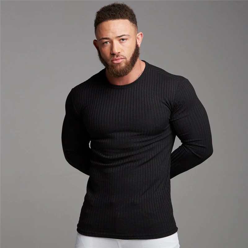 Suéteres de cuello redondo a la moda para hombre, jerseys de punto de tiras negras, suéter informal sólido, prendas de punto ajustadas para Otoño e