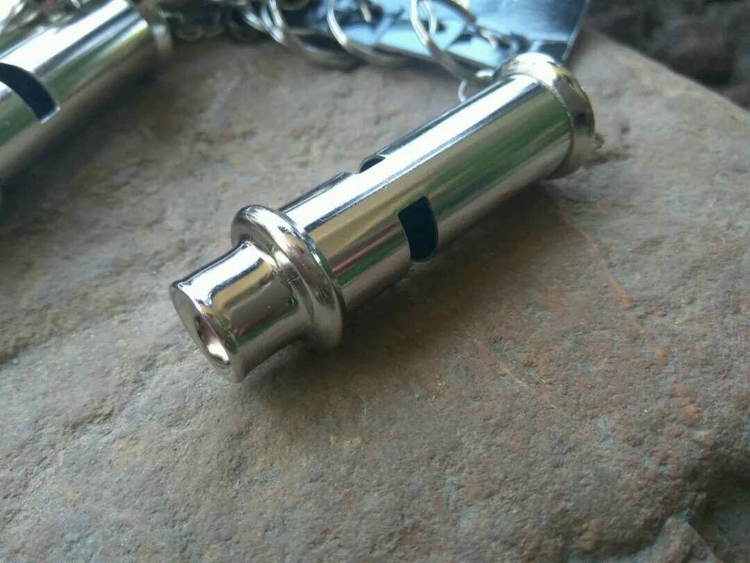 12PCS/LOT Stainless steel high-frequency high decibel whistle lifesaving metal outdoor survival whistle