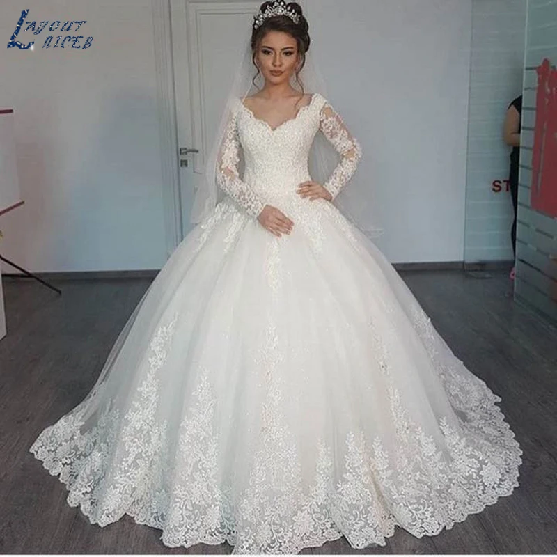 تخطيط NICEB الكرة ثوب طويل الأكمام فستان الزفاف النساء أنيقة الدانتيل يزين Vestido De Noiva الاجتياح قطار خمر العروس الزفاف فستان حفلات الرقص فستان زفاف بأكمام طويلة فستان زفاف أنيقة Vestido De Noiva كشف القطار العروس