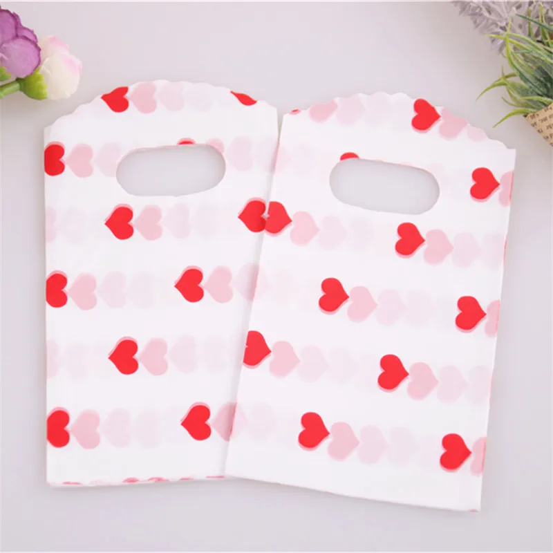 New Design Wholesale 50pcs/lot 9*15cm Mini Wedding Candy Pouches with Small Red Heart for lipstick Packaging