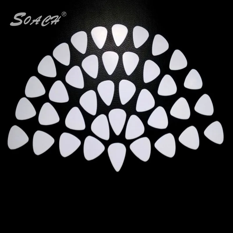SOACH New 10pcs/lot 1.0mm white high quality guitar picks Guitar neck Accessories tuner Musical instrument accessories paddle