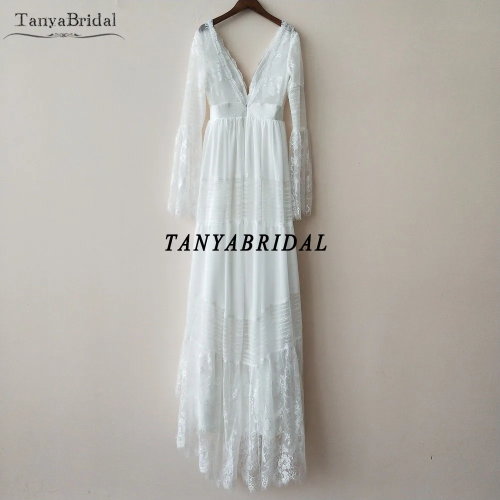 정교한 보헤미안 웨딩 드레스 긴 소매 레이스 비치 신부 가운 플레어 슬리브 백리스 베스 티드 드 Noiva 세련된 DW047