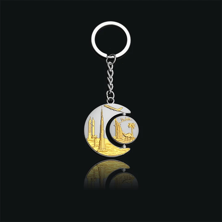 The landmark buildings in Dubai are placed in the shape of the moon and the sun Key buckle