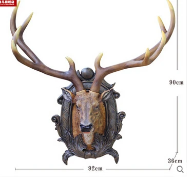 Simulation of large deer head hanging. Bar wall wall act the role ofing. Cafe. Solid wall coverings