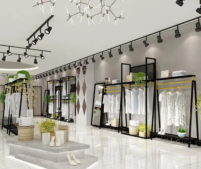 New fashion clothing store showcases floor-mounted men's and women's wear on display.