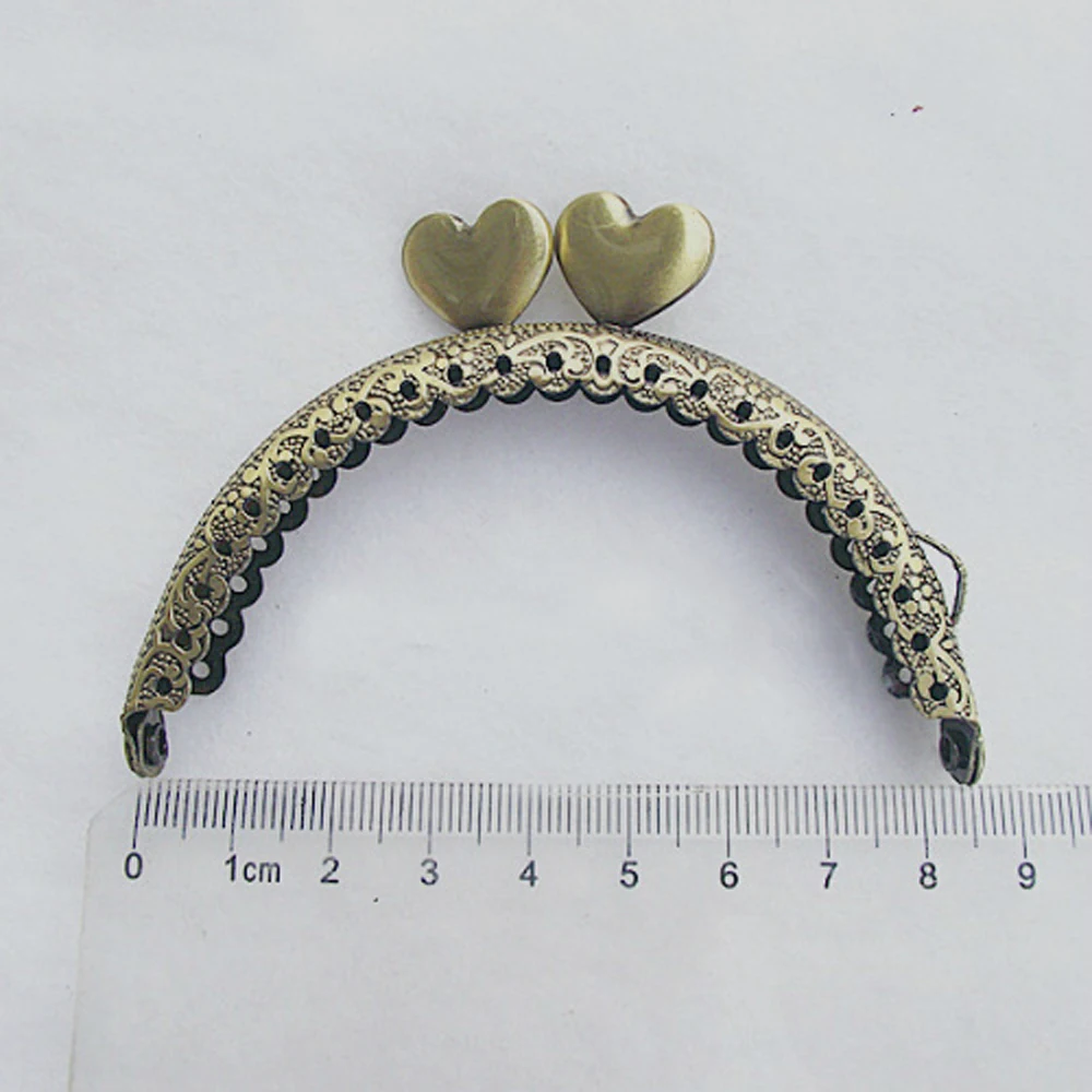 

8.5cm vintage jag edge knurling purse frame women DIY coin bag making metal clasp heart kiss buckle 10pcs/lot