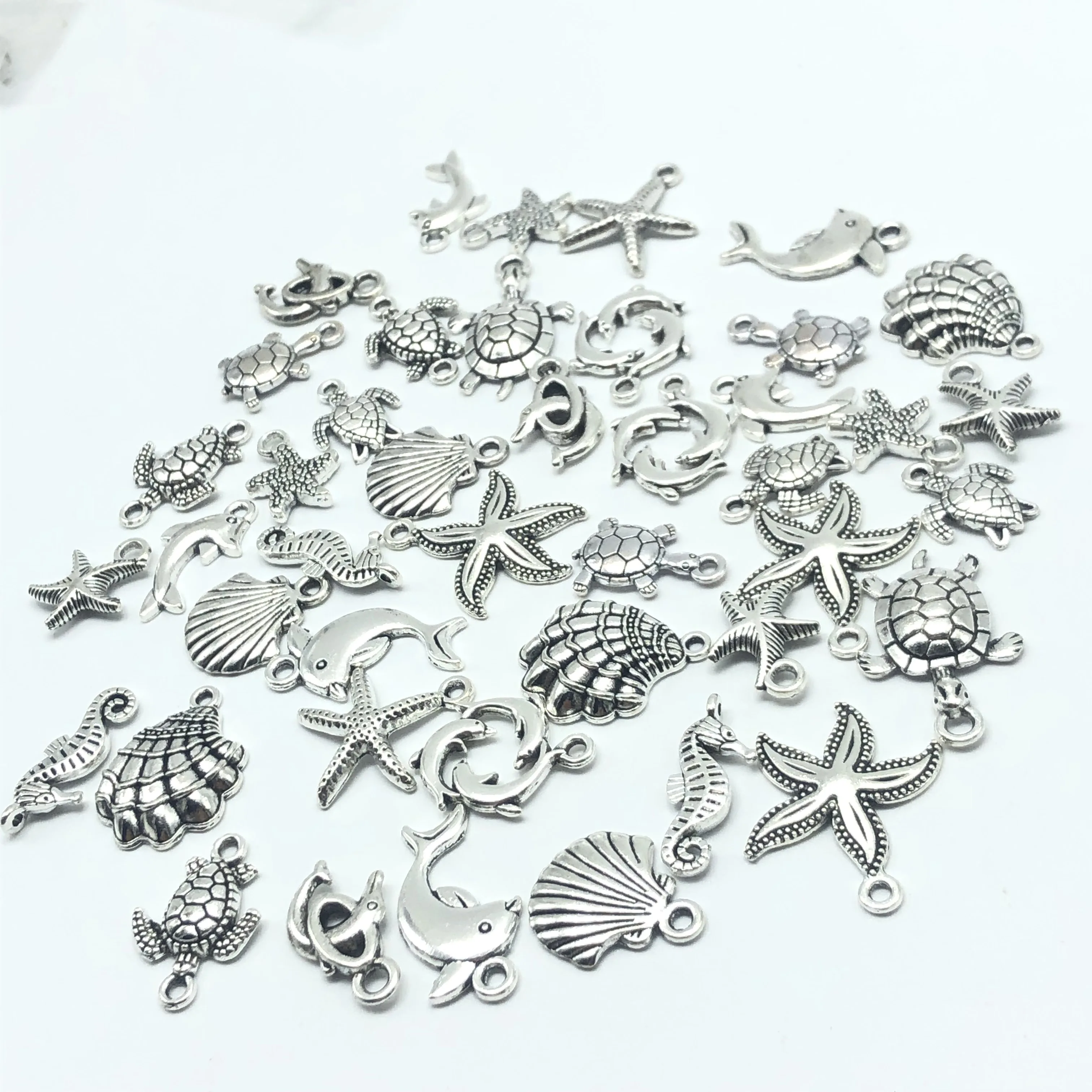 Alloy 30pcs Mixed batch Tibetan silver starfish turtles shell dolphins tortoise hippocampus Charm pendant jewellery Wholesale