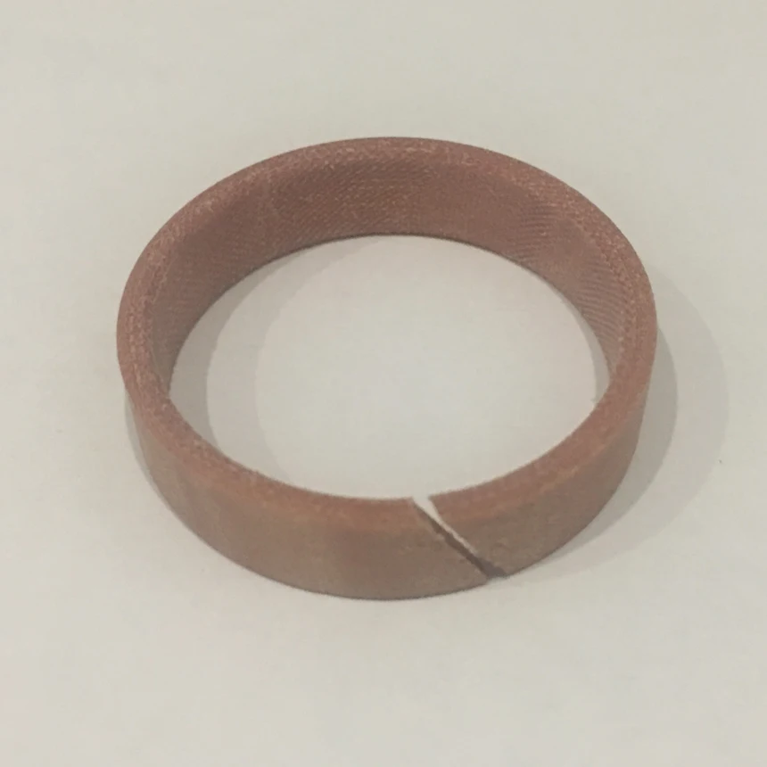 

63*58*9.7/15/20 63x58x9.7/15/20 70*65*9.7/15 70x65x9.7/15 Phenolic Fabric Resin Cylinder Piston Rod Seal Gasket Wear Guide Ring