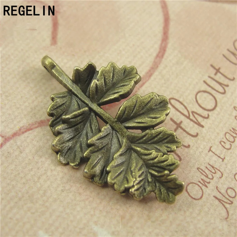 REGELIN-Colgante con forma de hoja de arce, colgante con forma de hoja de arce de bronce antiguo, 20x31mm, para collar Diy, fabricación de joyas,