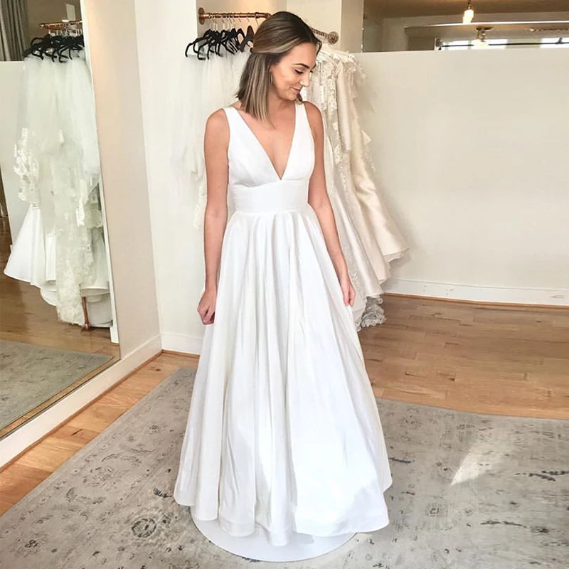 

Sexy V-neck Wedding Dresses Sleeveless New Arrival Beach Wedding Gowns White Ivory Cheap Bridal Dress vestidos de novia 2019