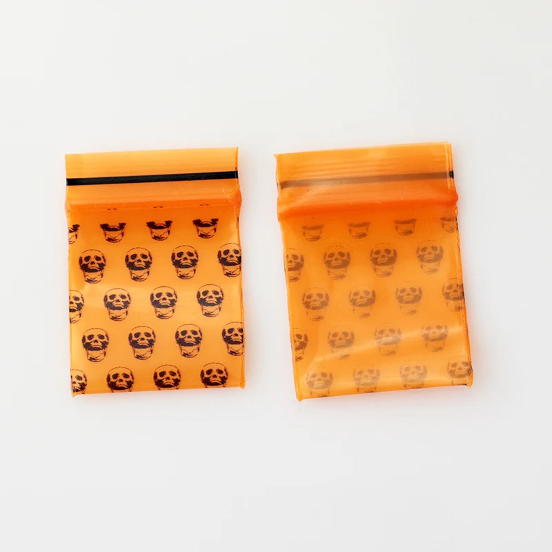 2*2.8CM Wholesale 300Pcs Orange Skull Printing Jewelry Pill Pearl Powder Hermetic Bag Zip Lock Plastic Gift Packaging Bags