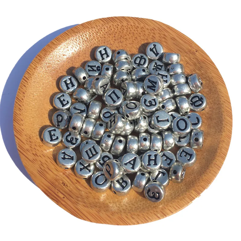 

Free Shipping 3400PCs/Lot Silver Color Russian Letters Beads 4*7MM Flat Coin Round Shape Plastic Acrylic Alphabet Initial Bead