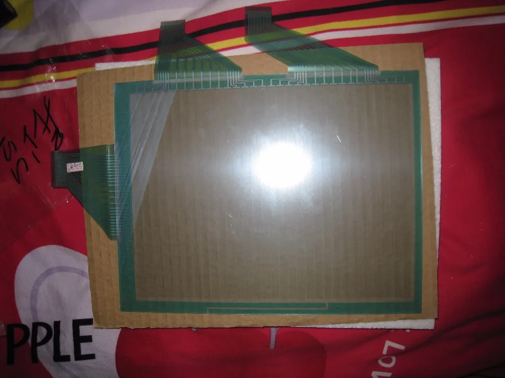 

new and original touch screen for NT631C-ST141B-EV1