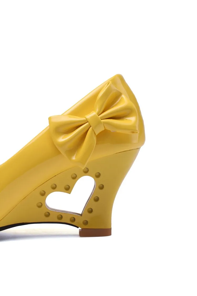 In the spring and autumn season  Bow fashionable candy color patent leather shoes  Hollowed-out wedge size women's shoes 34-43