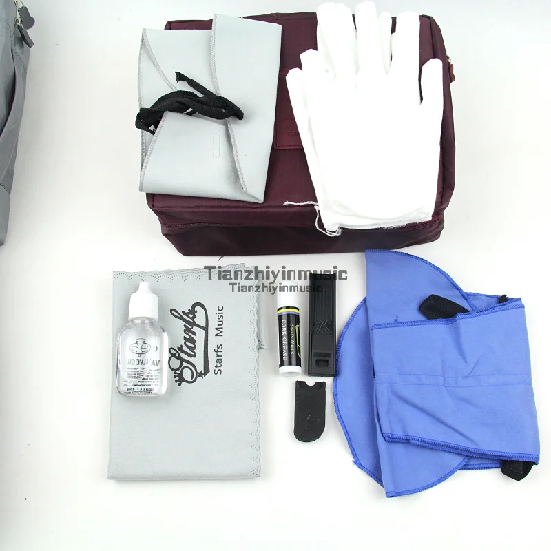 

Saxophone Cleaning and Maintenance Kit - Brush, Cloth, Grease, reeds Glove piston oil & more