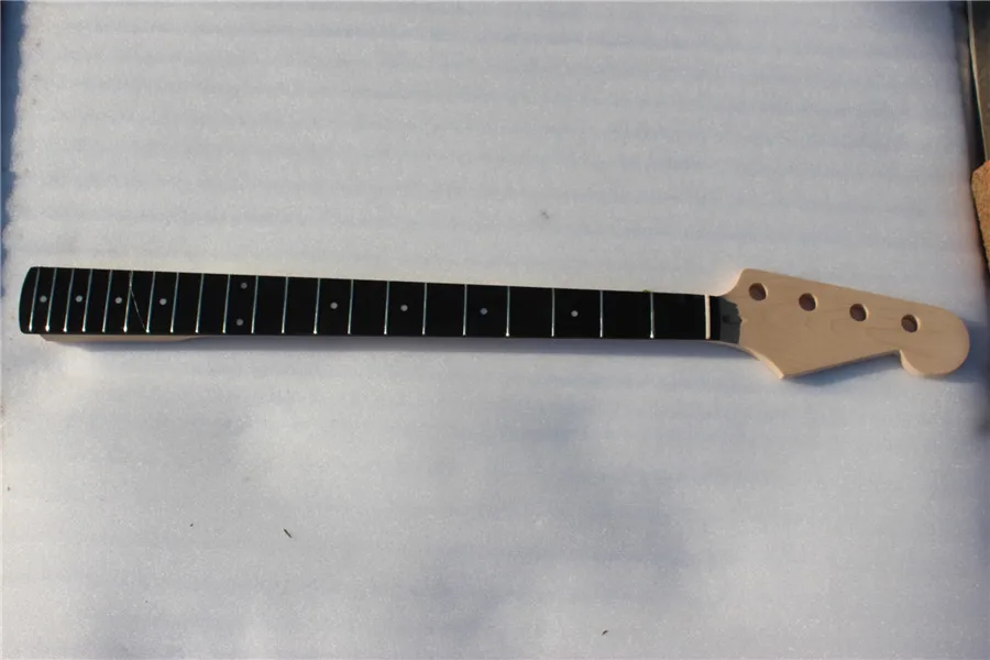 

one electric bass guitar neck high quality maple made with ebony fingerboard 21 fret