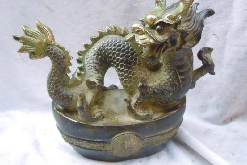 Chinese old bronze carved beautiful money luck Yuan bao dragon sculpture statue