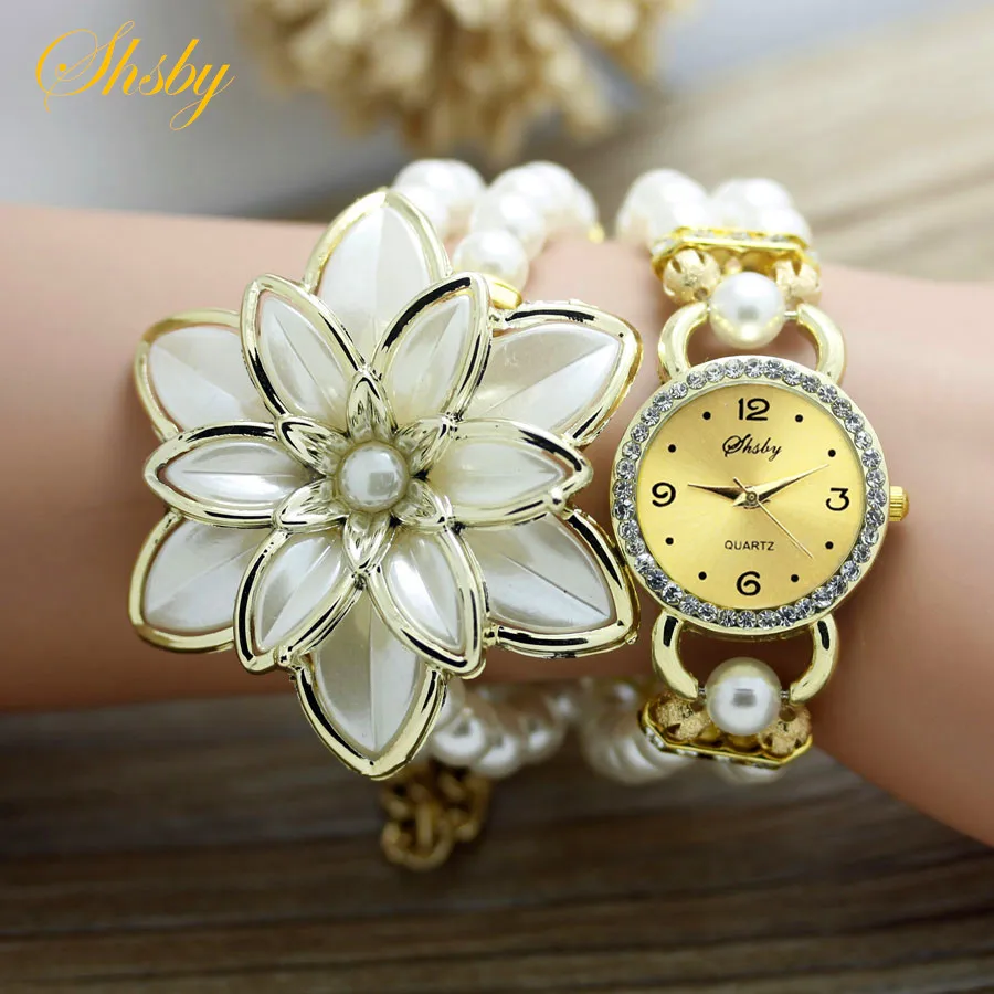 Shsby Fashion Women Rhinestone Watches  Ladies Pearl Strap Many Petals Flower Bracelet Quartz Wristwatches Women Dress Watches