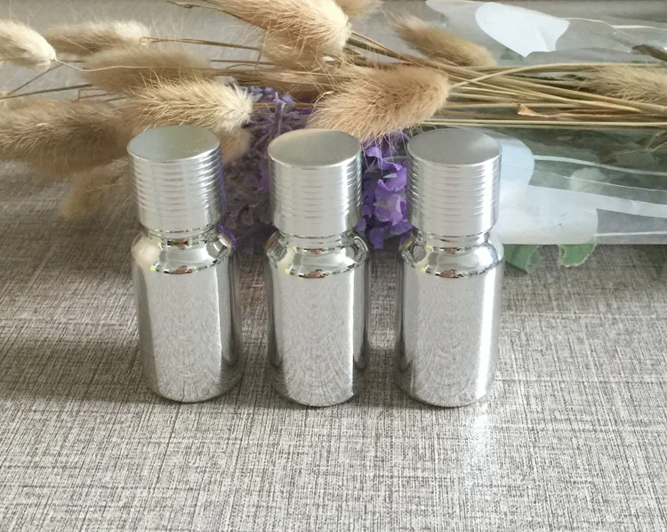 

100pcs Silver 10ml oil glass bottle with ribbed cap , wholesale grade sub-bottling 10 ml essential oil bottles and supplies