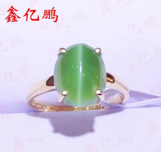 

Brief vogue jewelry 18 k gold inlaid natural jade female cat's eye ring Quality of a material is good birthday special