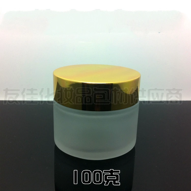 

30pcs wholesale 100g clear frosted glass cream jar with shiny gold aluminum lid, glass 100 g cosmetic container for eye cream