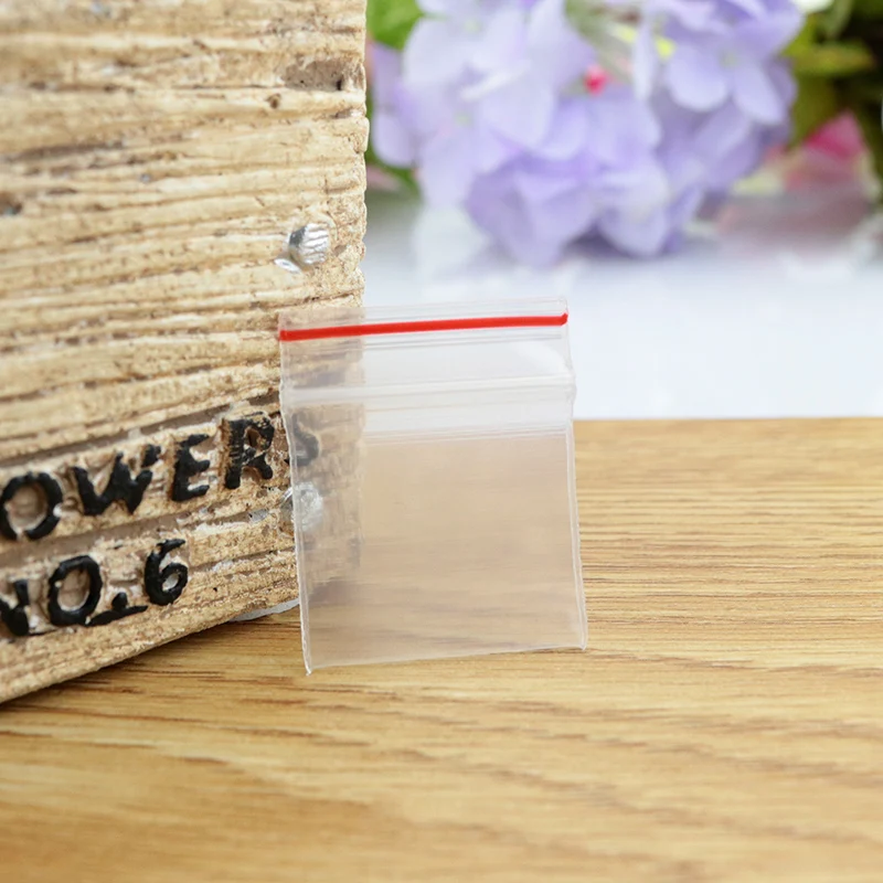 

Resealable Plastic PE Clear Zip Lock Bags 100pcs 4x4cm Jewelry Earring Necklace Gift Food Packaging Storage Bag