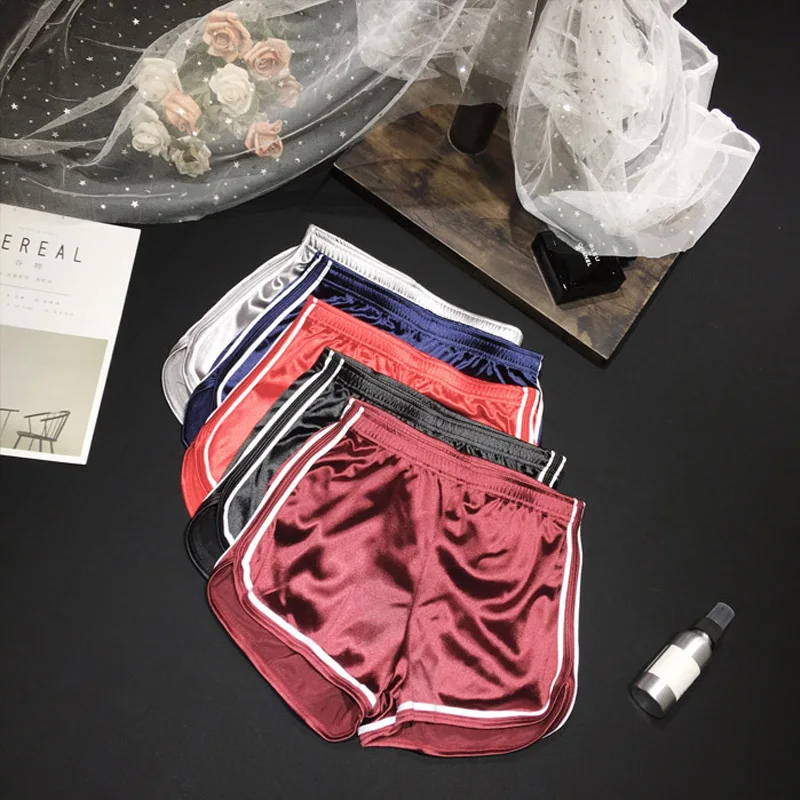 กางเกงขาสั้นผู้หญิงใหม่กางเกงขาสั้นผ้าไหมชายหาดสีขาวลำลองสีขาว EGDE ฤดูร้อน