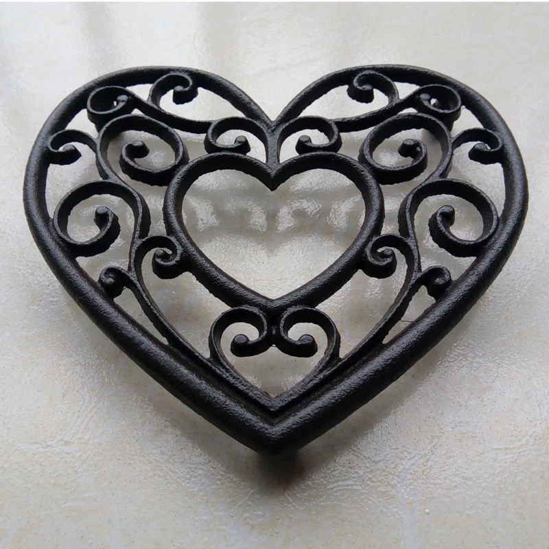 

Retro Black Heart Cast Iron Heat Insulation With Hollow Whril Pattern On European Farm House Accents Handmade Tabletop Metal Pad