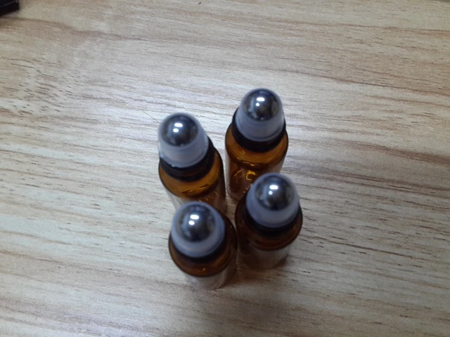 

500pcs/lot Free Shipping 5ML MINI ROLL ON Amber GLASS BOTTLES ESSENTIAL OIL Steel Metal Roller Ball Fragrance Perfume bottle