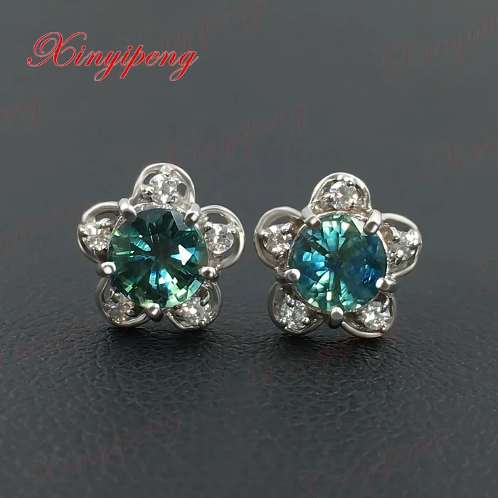 

18 k white gold with 100% natural sapphire studs earrings Blue green color of fire Fine jewelry contracted
