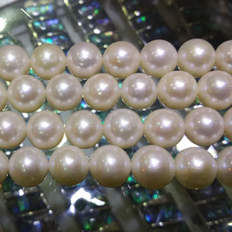 16 inches AA+ 10-11mm Natural White Round Freshwater Pearl Loos Strand