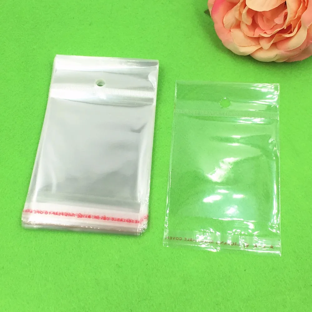 1000 pcs 12x6.5 cm Batal Transparan OPP Tas dengan Menggantung lubang Packing Plastik Tas Self Adhesive Seal tahan air OPP Tas