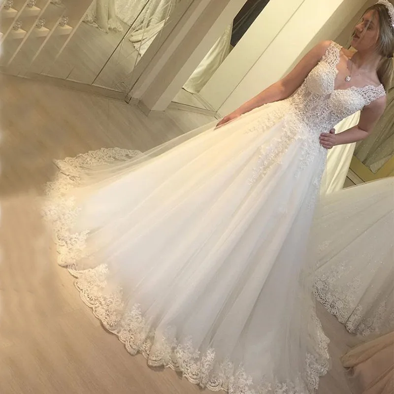 2019 Elegant A Line Wedding Dresses V-neck Sleeves Appliques Heavy Beading Bridal Gowns Floor Length White Ivory Wedding Gowns