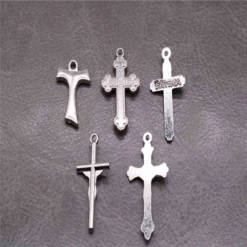 10 pieces of many styles of tiny Dongzheng Jesus cross. Catholic Mini Cross. Bead necklace accessories