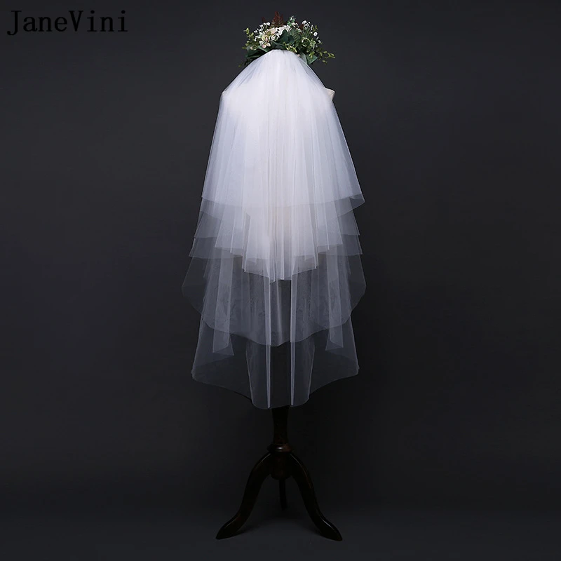 JaneVini Elegante Ivoor Multi Lagen Wedding Veils Cut Edge Vingertop Lengte Sluier Tule Bruidssluier met Kam Velos Novias Boda