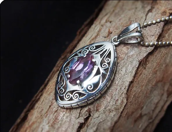 

Nepal. Elegant and noble natural amethyst. 925 Silver Hand-carved Delicate Pendant