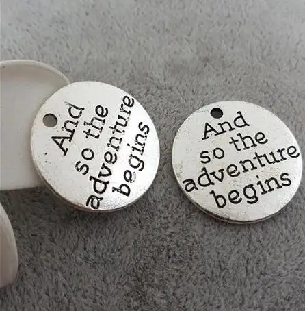 High Quality 10Pieces/Lot Diameter 25mm Letter Engraved And So The Adventure Begins Quote Message Charm Pendant For Diy Making