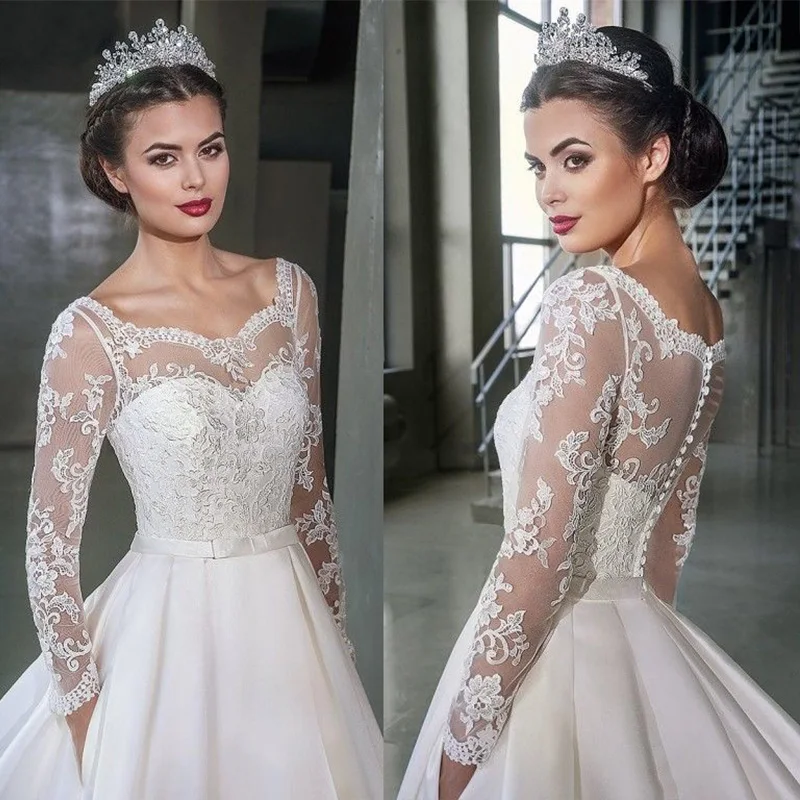 Nowe eleganckie niestandardowe koronkowe kurtki ślubne z wycięciem pod szyją Białe bolerka w kolorze kości słoniowej Owijki z guzikami z tyłu Zamknięta kurtka ślubna