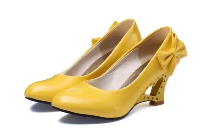 In the spring and autumn season  Bow fashionable candy color patent leather shoes  Hollowed-out wedge size women's shoes 34-43